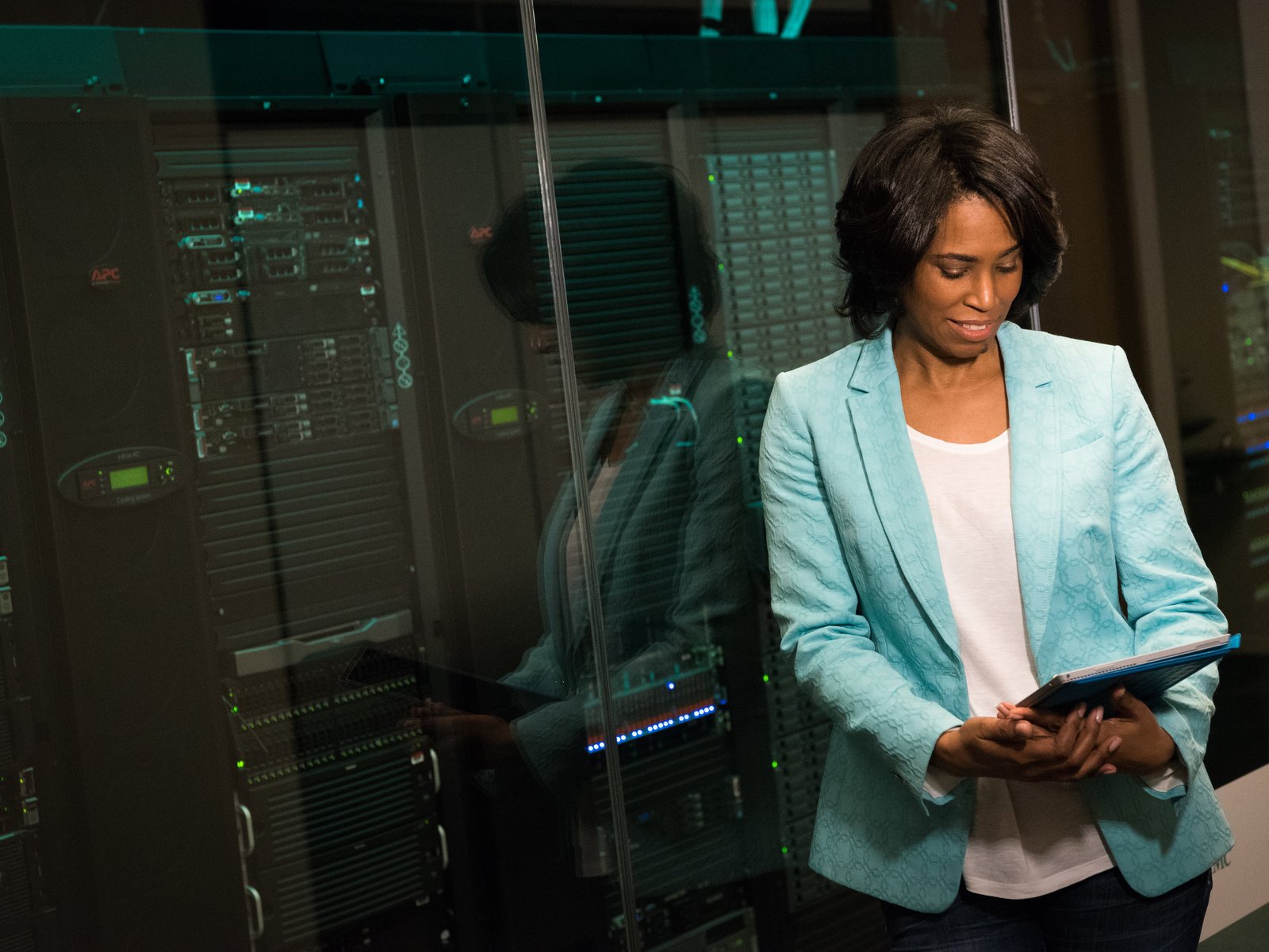 A cloud security engineer reviewing server infrastructure