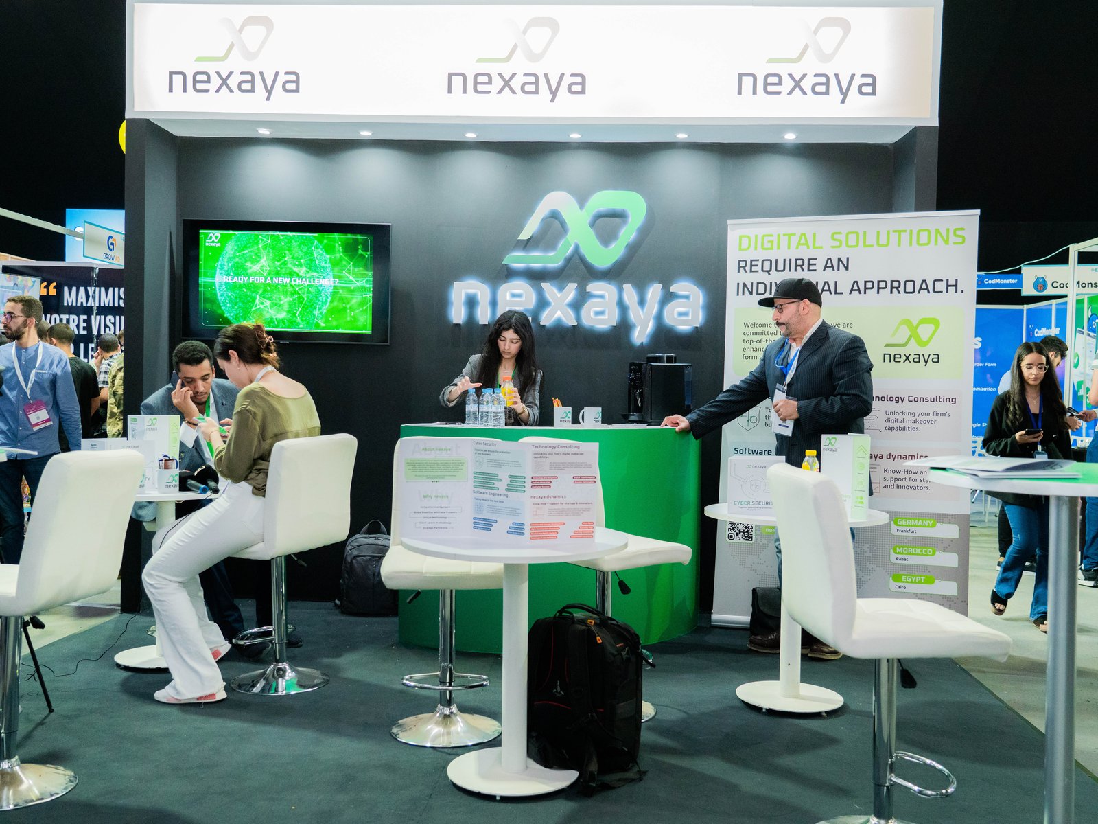 nexaya team at a digital transformation event booth